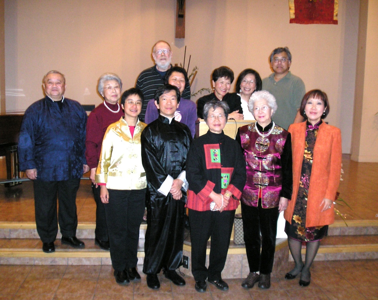 A group of people posing for a photo

AI-generated content may be incorrect.