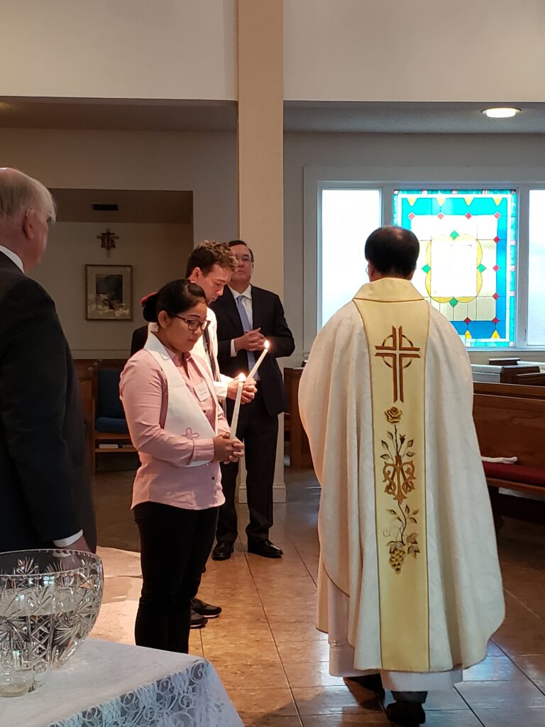 April 12 Onah and Imran are baptized, confirmed and receive communion