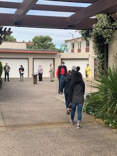 People lined up for distribution of communion